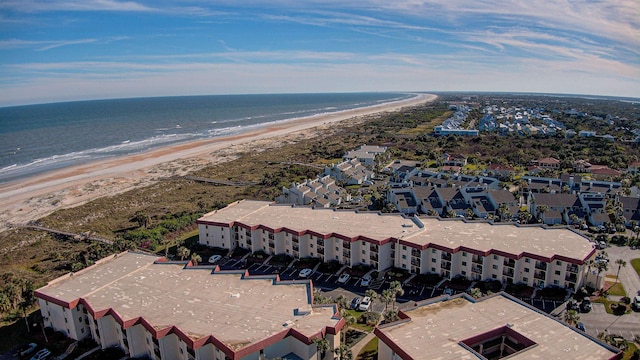 aerial view with a view of the beach and a water view