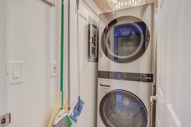 laundry room featuring stacked washer / dryer