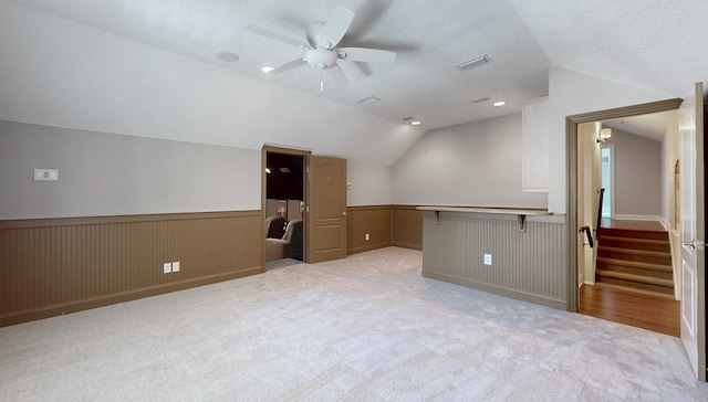 113 Holly Berry Ln, Saint Johns, FL 32259 - bonus room featuring lofted ceiling, ceiling fan, and a wainscoted wall
