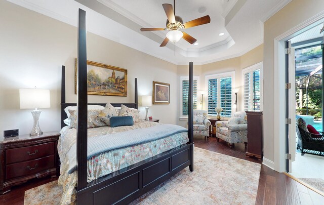 113 Holly Berry Ln, Saint Johns, FL 32259 - bedroom featuring crown molding, hardwood / wood-style flooring, recessed lighting, access to exterior, and a tray ceiling