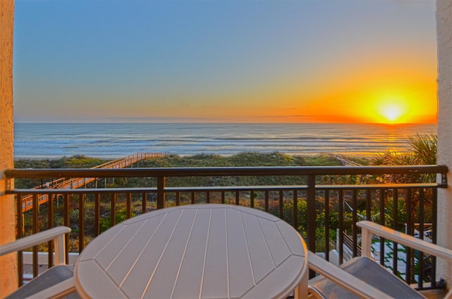 balcony at dusk with a water view