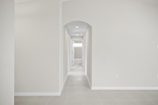 hallway with light tile patterned flooring