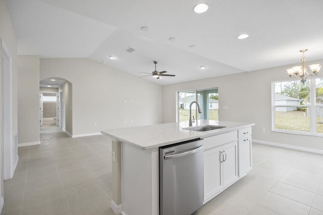 kitchen with lofted ceiling, sink, dishwasher, a kitchen island with sink, and white cabinets