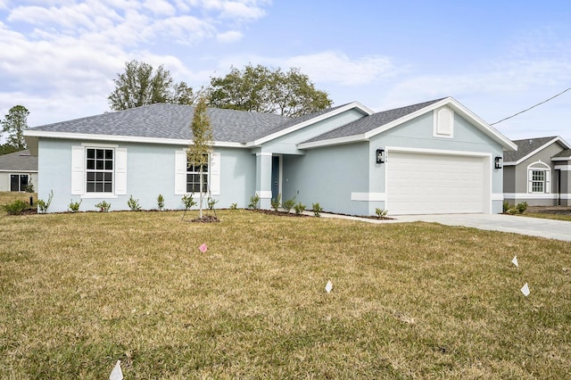 ranch-style house featuring a garage and a front lawn