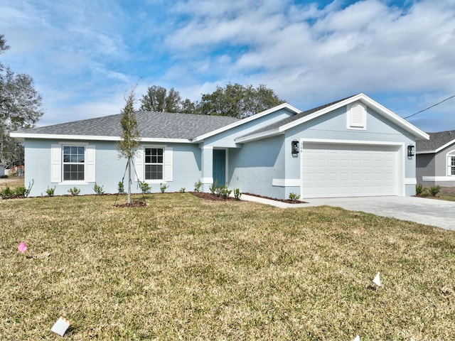 ranch-style home with a garage and a front yard