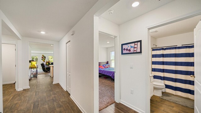 4004 Chihuahua Ct, Jacksonville, FL 32218 - hallway featuring dark wood-type flooring, healthy amount of natural light, and recessed lighting