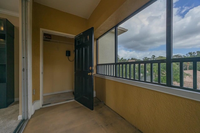 doorway to property with a balcony