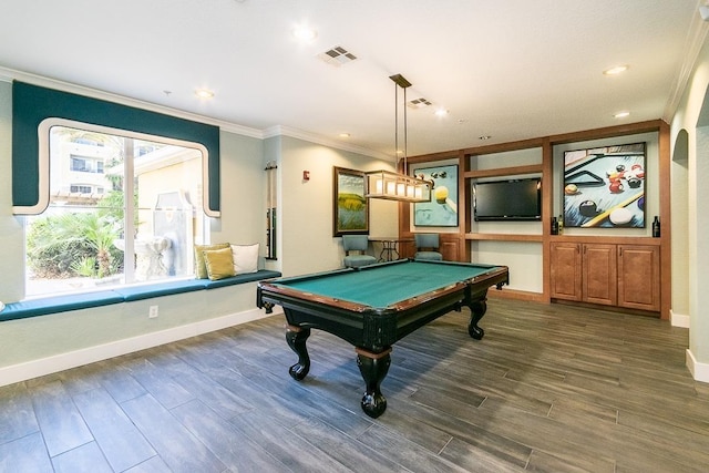 game room featuring billiards, crown molding, and dark hardwood / wood-style floors