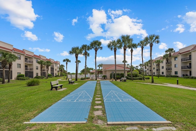 view of community with a lawn