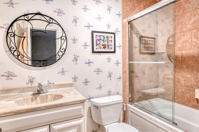 8550 S A1A Unit 323, Saint Augustine, FL 32080 - bathroom featuring enclosed tub / shower combo, vanity, and toilet