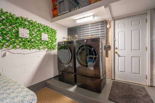 209 Alerto St, Saint Augustine, FL 32080 - washroom with washing machine and dryer and concrete block wall