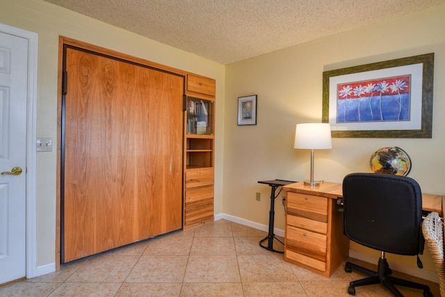 4 Ocean Trace Rd Unit 323, Saint Augustine Beach, FL 32080 - office area featuring a textured ceiling and light tile patterned floors