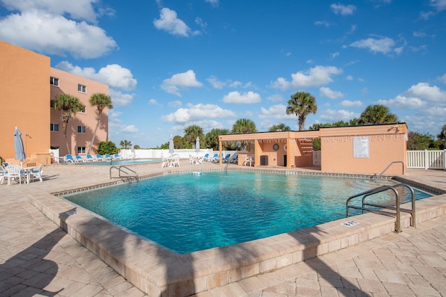 view of pool featuring a patio