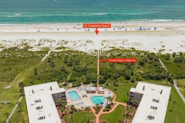 4 Ocean Trace Rd Unit 323, Saint Augustine Beach, FL 32080 - aerial overview of property's location with expansive coastline and a pool area