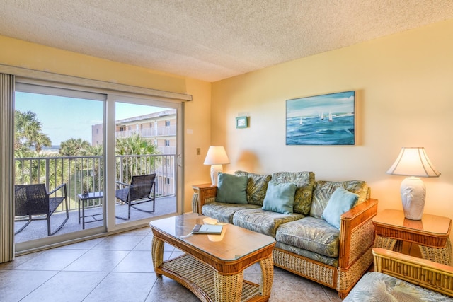 4 Ocean Trace Rd Unit 323, Saint Augustine Beach, FL 32080 - living room with a textured ceiling and light tile patterned flooring