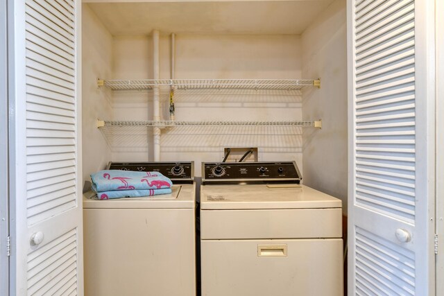4 Ocean Trace Rd Unit 323, Saint Augustine Beach, FL 32080 - laundry room featuring washer and clothes dryer