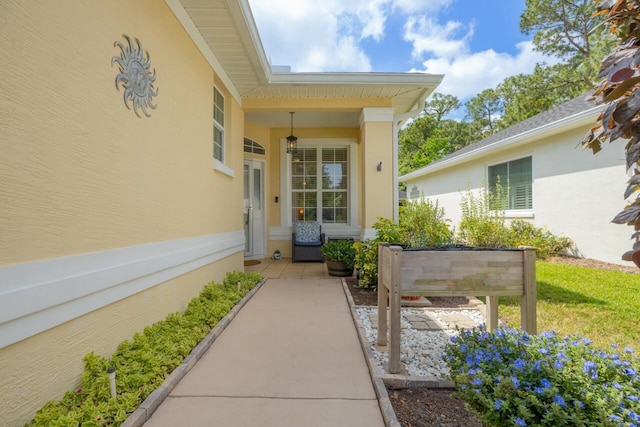 717 Crestwood Dr, Saint Augustine, FL 32086 - entrance to property featuring stucco siding