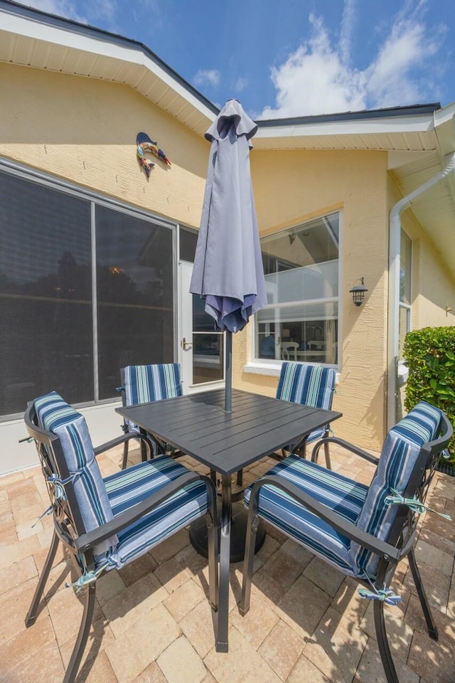 717 Crestwood Dr, Saint Augustine, FL 32086 - view of patio with outdoor dining area