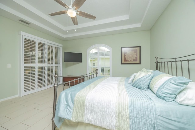717 Crestwood Dr, Saint Augustine, FL 32086 - bedroom with visible vents, a raised ceiling, and ceiling fan