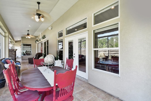 view of patio with ceiling fan and french doors