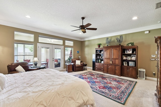 bedroom with access to outside, ceiling fan, french doors, and a textured ceiling