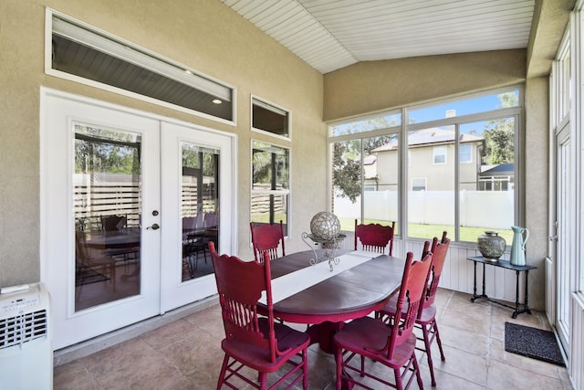 sunroom / solarium featuring wooden ceiling, french doors, and vaulted ceiling