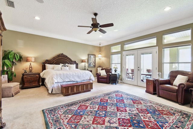 bedroom featuring access to exterior, french doors, light colored carpet, and ceiling fan