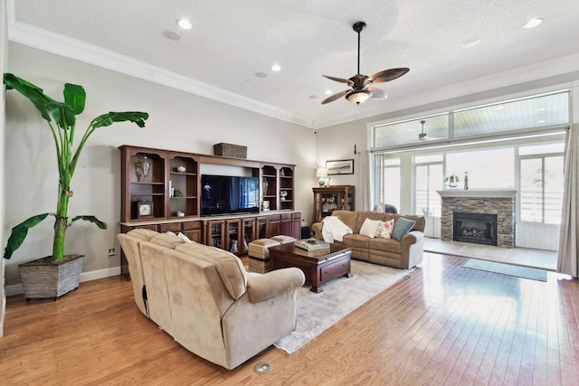 living room featuring a textured ceiling and light wood-type flooring