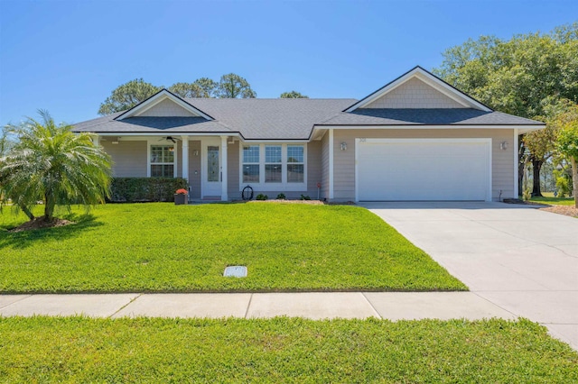 301 Graciela Cir, Saint Augustine, FL 32086 - single story home with a ceiling fan, a front lawn, concrete driveway, an attached garage, and covered porch