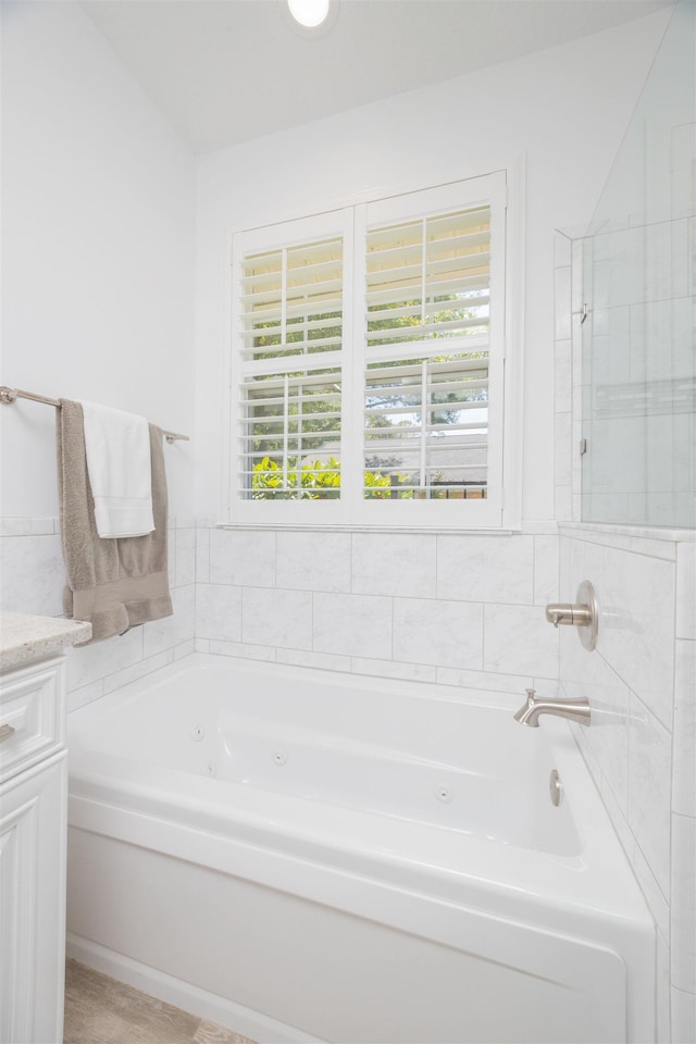 301 Graciela Cir, Saint Augustine, FL 32086 - full bathroom featuring a jetted tub and vanity
