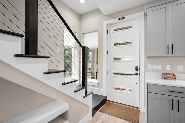 entrance foyer featuring a healthy amount of sunlight and light hardwood / wood-style flooring