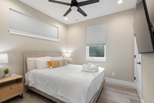 bedroom featuring ceiling fan and light wood-type flooring