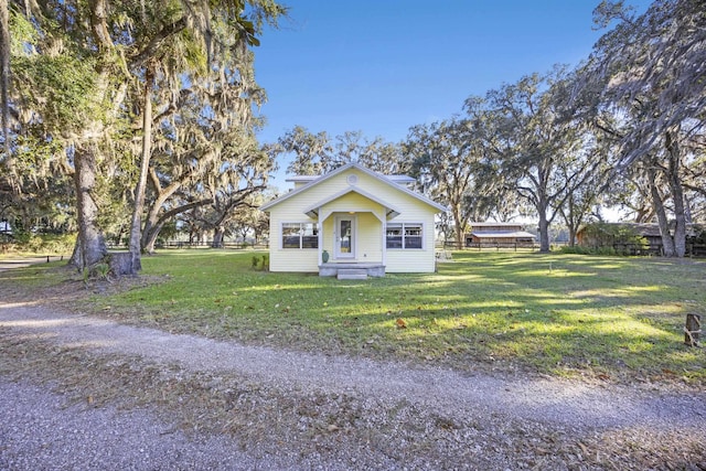 view of front of house with a front lawn