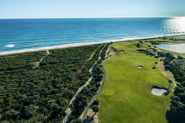 drone / aerial view featuring a beach view and a water view