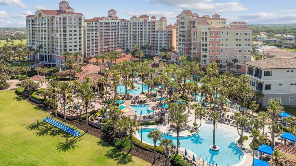 200 Ocean Crest Dr Unit 333, Palm Coast, FL 32137 - drone / aerial view featuring a city view
