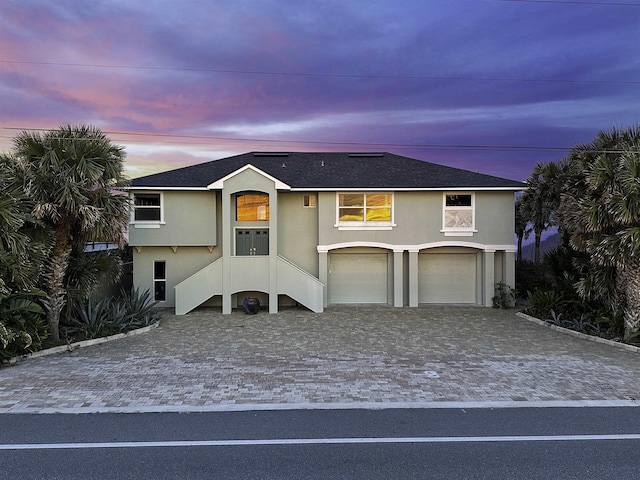 view of front of home with a garage