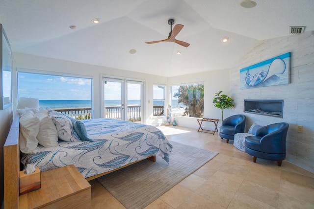 bedroom featuring access to exterior, ceiling fan, a water view, and vaulted ceiling