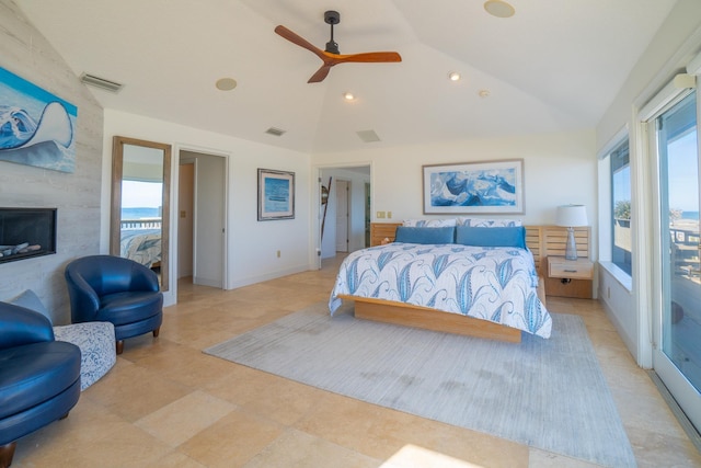 bedroom with multiple windows, ceiling fan, vaulted ceiling, and access to exterior