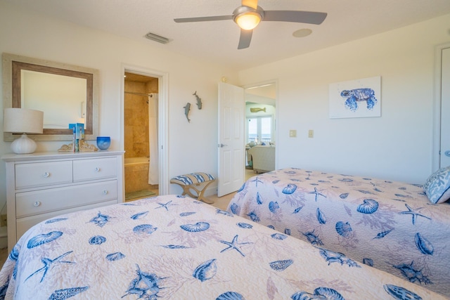 bedroom featuring ensuite bath and ceiling fan