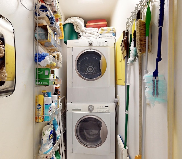  - clothes washing area with estacked washer and dryer