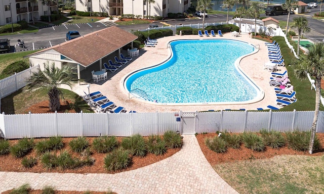  - community pool featuring a patio