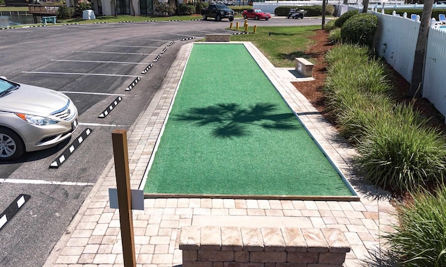  - uncovered parking lot with fence