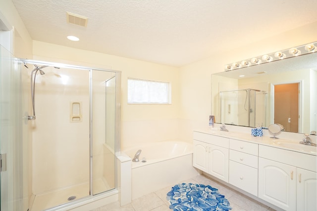 209 Lions Gate Dr, Saint Augustine, FL 32080 - full bath with visible vents, a shower stall, tile patterned floors, a sink, and a garden tub