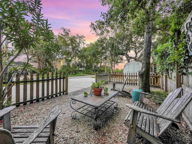 10 Seminole Dr, Saint Augustine, FL 32084 - fenced backyard with a patio area