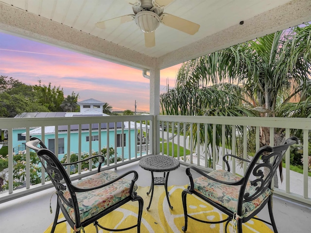 10 Seminole Dr, Saint Augustine, FL 32084 - balcony at dusk featuring ceiling fan