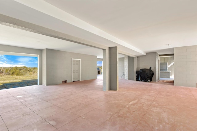 136 Lawn Ave, Saint Augustine, FL 32084 - below grade area featuring tile patterned flooring and plenty of natural light