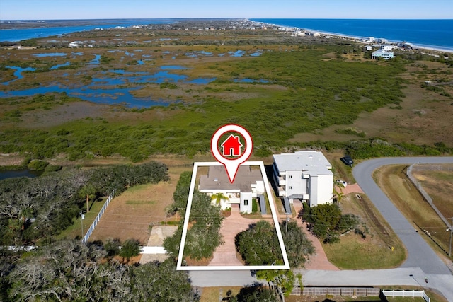 136 Lawn Ave, Saint Augustine, FL 32084 - aerial view of property and surrounding area featuring a nearby body of water and property parcel outlined