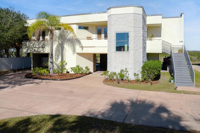 136 Lawn Ave, Saint Augustine, FL 32084 - view of building exterior featuring stairs