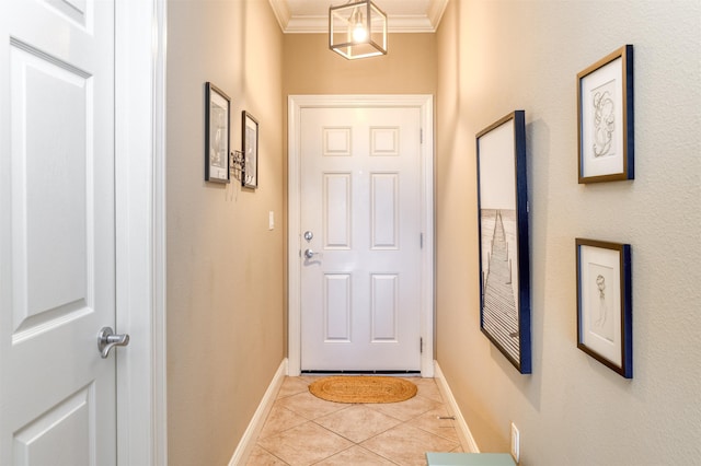 doorway featuring light tile patterned floors and crown molding