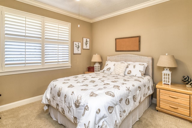 carpeted bedroom with ornamental molding and a textured ceiling